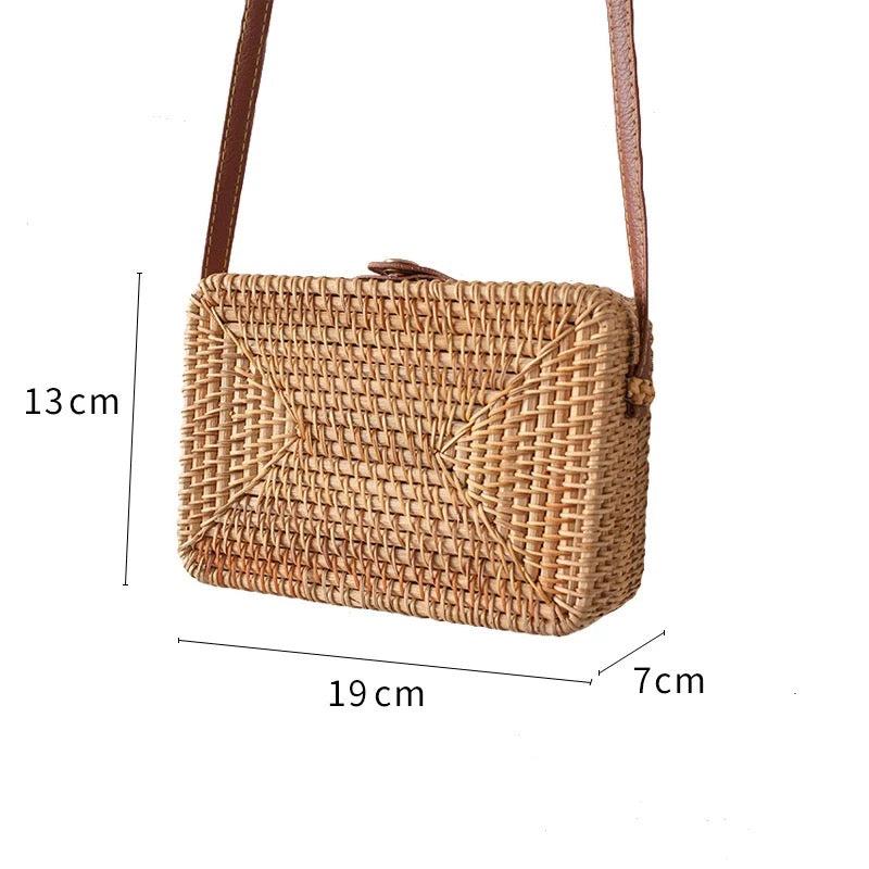 Rattan Box Bag with secure snap closure and natural woven design, measuring 19 cm x 13 cm x 7 cm, perfect for casual outings.